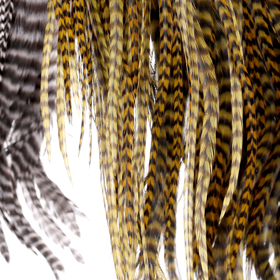 P-21430_hareline_half-grizzly-predator-saddle_detail